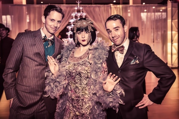 Two men and a women in fancy dress